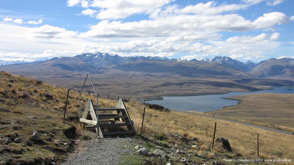 Lake Tekapo (part) and Southern Alps from Mt John